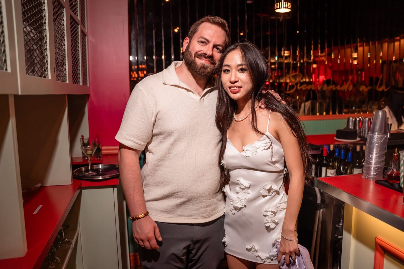 Clarissa and John photographed together at their South Florida rehearsal dinner